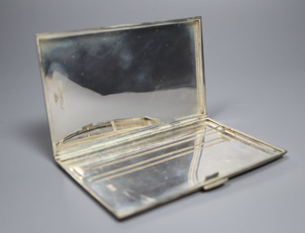 Two silver cigarette boxes, a silver cigarette case and Thai white metal cigarette box, largest 18.7cm.